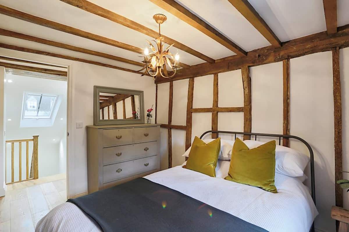 Bedroom with exposed beams